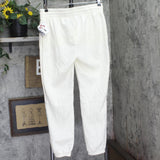 The Grinch Holiday Graphic Jogger Pajama Pants with Drawstring Cream Off White M