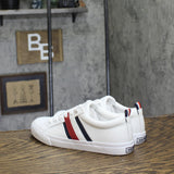 Tommy Hilfiger Womens Low Top Skater Sneaker Lace-Up Flat White Multi 6.5M