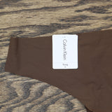 Calvin Klein Womens Invisibles Thong Underwear D3428 D3428 Chestnut Brown S