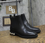 On 34th Womens Jeovana Pearl Chelsea Booties 10019682400 Black Smooth 5.5M