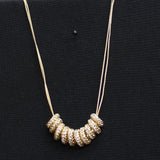 NRDSTRM Rack Chain Interlocking Rhinestone Rings Necklace Gold / Clear 16" + 2"
